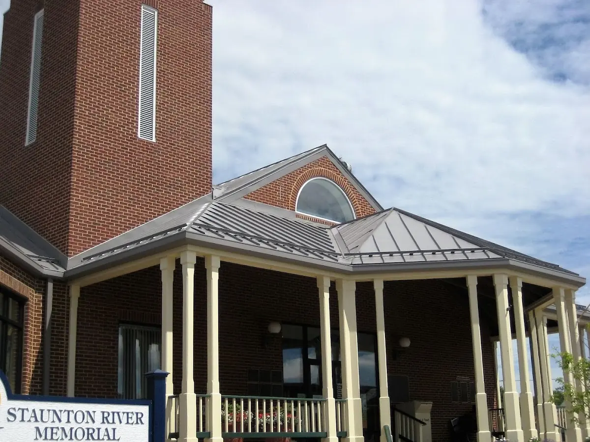 Skilled roofing craftsmen working on a residential roof in Florence Hill